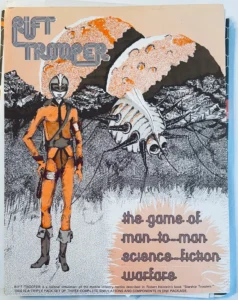 A vintage game cover titled "RIFT TRIPPER" featuring stylized retro artwork with an alien figure in an orange suit and a large insect-like creature amid a black and white sketched landscape with explosions, accompanied by text "the game of man-to-man science-fiction warfare" and a note of its connection to Robert Heinlein's book "Starship Troopers".