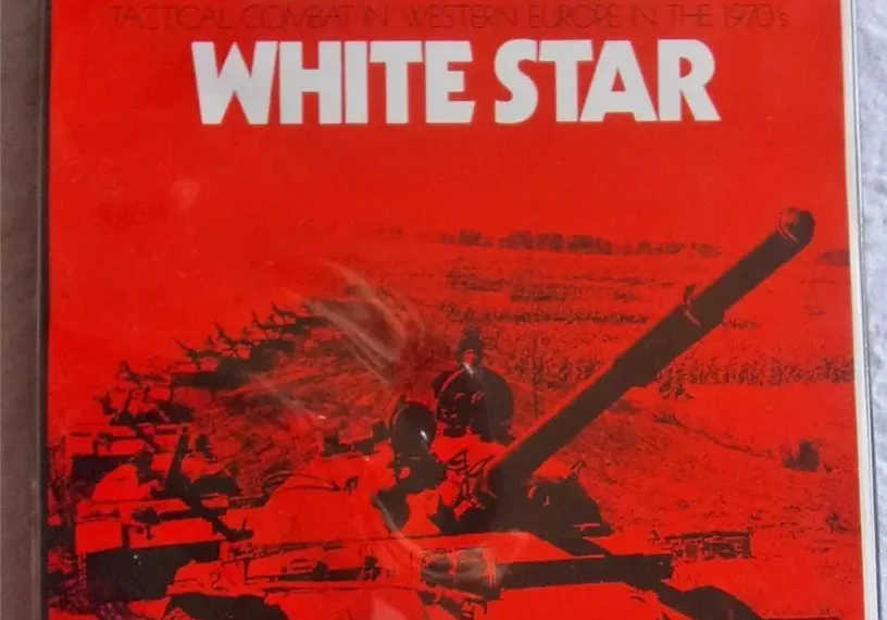 Board game titled "RED STAR / WHITE STAR," with subtitle "Tactical Combat in Western Europe in the 1970's" displayed at the top. The cover features an image of a tank and soldiers in battle, with text indicating the time as 0200 hrs, Summer 1975. The overall color scheme is red and black, typical for military simulation game packaging.