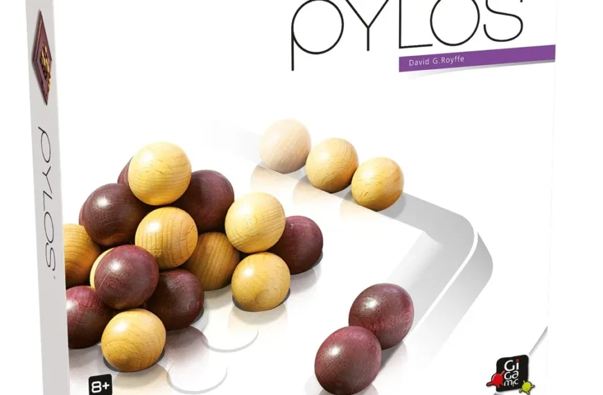 Box of "Pylos" game with multicolored wooden spheres scattered around it, indicating the game components, for ages 8+, designed by David G. Royffe.