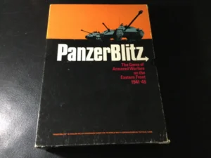 A worn-out board game box for "PanzerBlitz: The Game of Armored Warfare on the Eastern Front 1941-45" on a dark surface, featuring an orange and black color scheme with a tank silhouette.