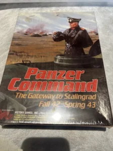 A worn box cover for the board game "Panzer Command: The Gateway to Stalingrad, Fall 42 – Spring 43," featuring an illustrated military officer and a fiery battlefield in the background.