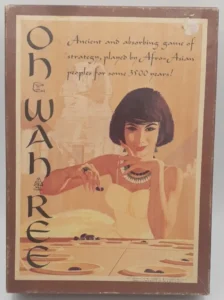 Alt text: A vintage board game cover titled "OH-WAH-REE" with the subtitle "Ancient and absorbing game of strategy played by Afro-Asian peoples for some 3500 years!" It features an illustration of a woman with a bob hairstyle playing the game, which consists of a wooden board with carved pits and dark playing pieces. The cover has a beige color scheme and includes the logo of the 3M bookshelf game series.