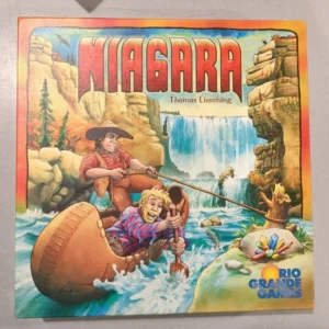 "Board game cover art for 'Niagara' featuring two cartoon characters in a barrel boat near the edge of a waterfall, with vibrant illustrations of cliffs, trees, and the Rio Grande Games logo."