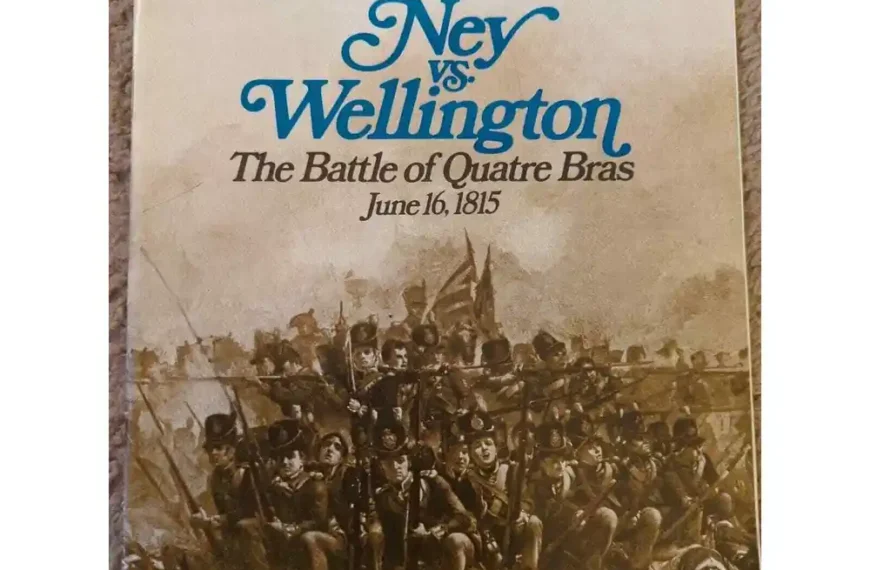 A magazine cover for "Strategy & Tactics" featuring the title "Ney vs. Wellington: The Battle of Quatre Bras, June 16, 1815," with an aged paper background and an illustration of a Napoleonic era battle scene below the text.