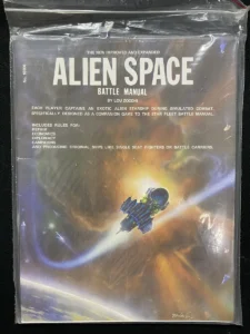 A book titled "ALIEN SPACE Battle Manual" by Lou Zocchi covered in plastic wrap with a space-themed illustration featuring a spacecraft on the cover.