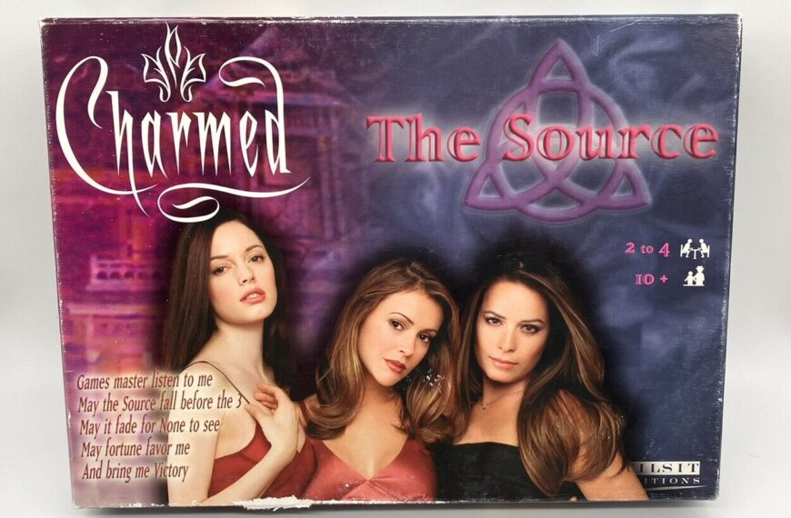 Board game "Charmed: The Source" box cover featuring three women with a triquetra symbol and text suitable for ages 10 and up, for 2 to 4 players.