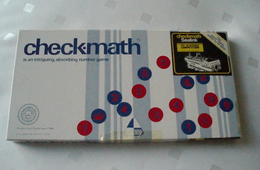 A checkmath board game box with red and blue numbered circles scattered across its surface and a small yellow sticker on the top right promoting a competition.