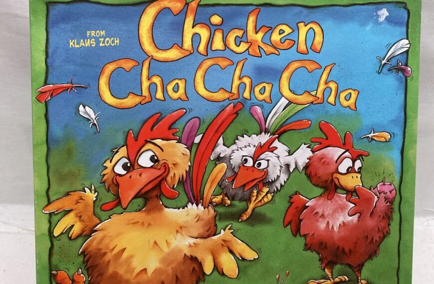 A colorful board game box cover titled "Chicken Cha Cha Cha" with cartoon images of three chickens and various insects, designed by Klaus Zoch, by Zoch zum Spielen and Rio Grande Games.