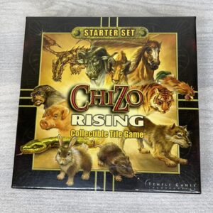 The image shows a boxed "Chizo Rising Starter Set" for a collectible tile game, featuring illustrations of various animals like a bull, horse, tiger, pig, snake, rabbit, rat, and a wolf on the cover.