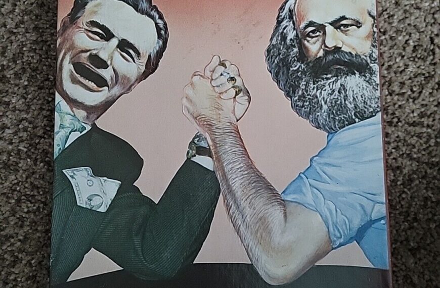 "Board game cover titled 'CLASS STRUGGLE' featuring caricature illustrations of two men arm wrestling, with one man representing capitalists and the other representing workers, and the subtitle 'GAME of life in Capitalist America!'"