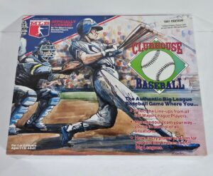 The image is of a 1991 edition of the Clubhouse Baseball board game box, featuring colorful artwork of a baseball batter and catcher in action, with game details and features listed on the front.