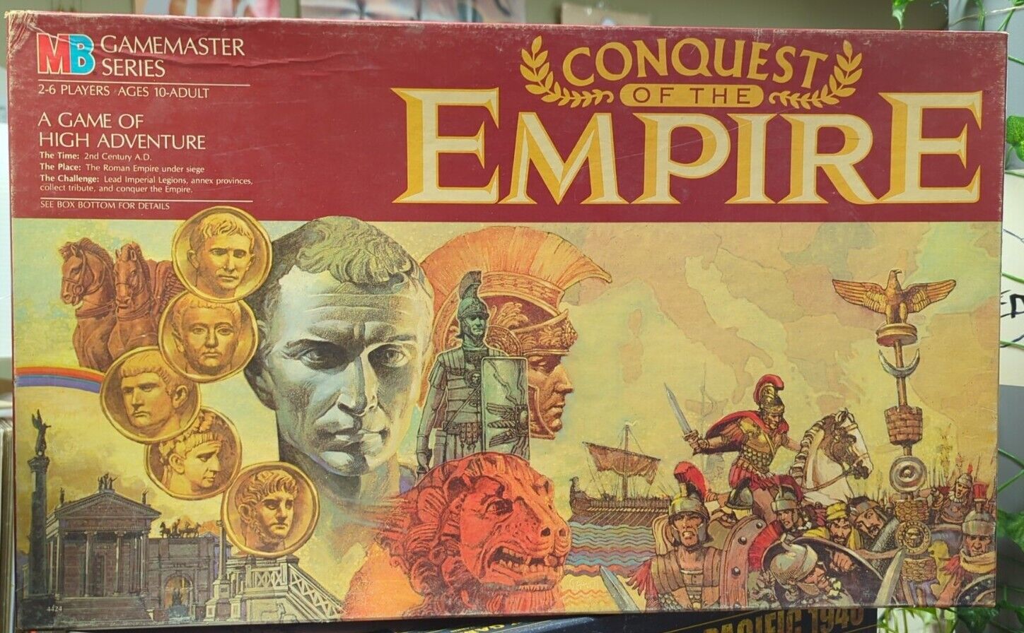 Board game box cover titled "Conquest of the Empire" from the MB Gamemaster Series, depicting Roman-themed illustrations including emperor portraits, soldiers, ancient architecture, and a map background. Suitable for 2-6 players, ages 10-adult.