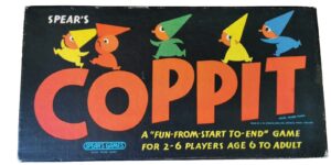 A vintage board game cover titled "COPPIT" by Spear's Games, depicting colorful cone-hatted figures on a black background, indicating it's for 2-6 players ages 6 to adult.