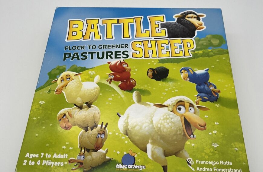 A board game box titled "BATTLE SHEEP" with cartoon images of sheep of different colors on a green pasture with the text "FLOCK to GREENER PASTURES." Indicated for "Ages 7 to Adult" and "2 to 4 Players." The game is from Blue Orange with credits to Francesco Rotta and Andrea Femerstrand.