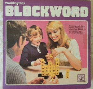 A vintage board game cover for "Waddingtons BLOCKWORD" featuring two adults and a child happily playing a word building game.