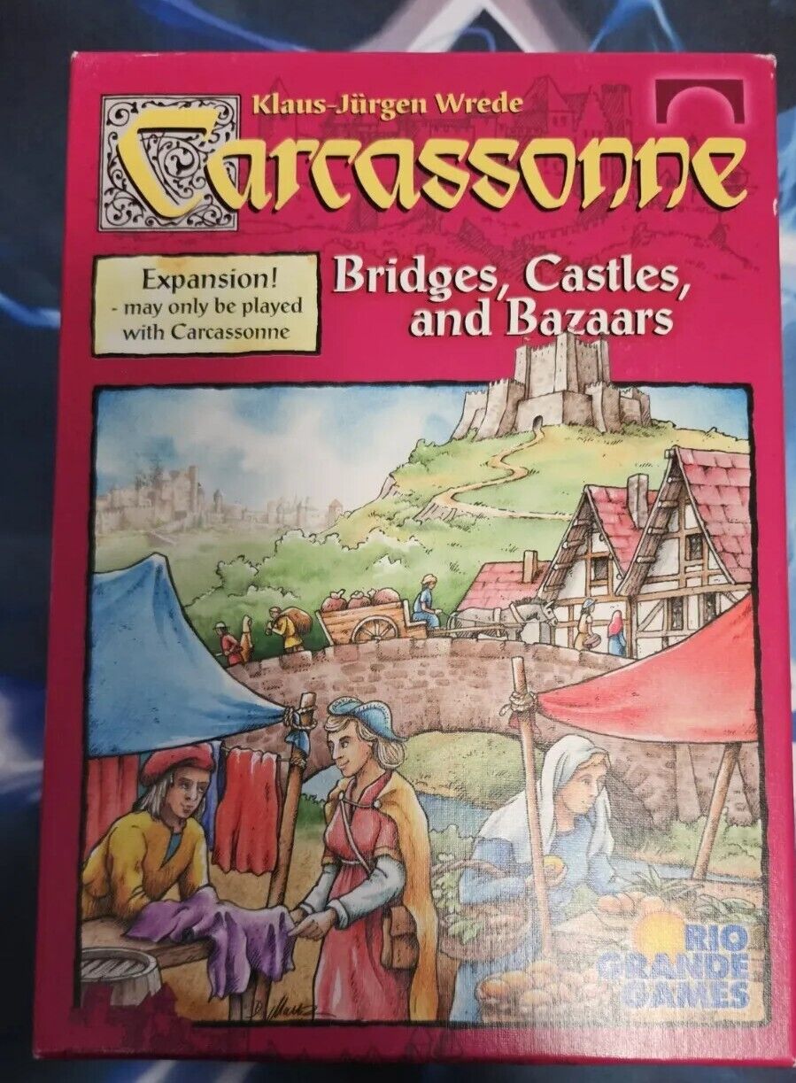 Box cover of "Carcassonne: Bridges, Castles, and Bazaars" expansion with medieval-themed illustration, including characters trading goods in a market and a castle in the background.