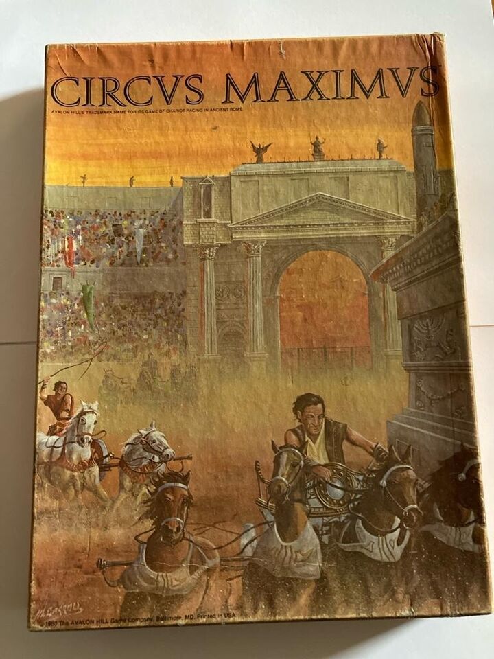 A weathered board game box for "CIRCUS MAXIMUS" featuring an illustration of a chariot race in ancient Rome, with charioteers driving horses amidst a large cheering crowd and classical Roman architecture in the background.