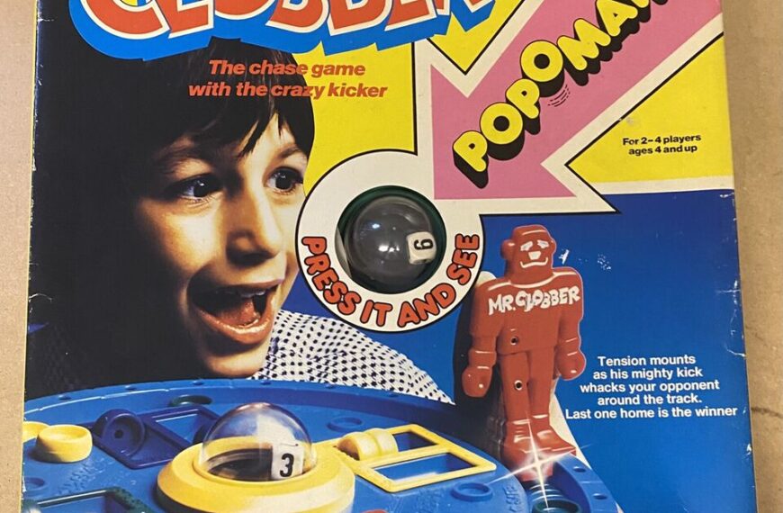 A vintage board game box for "CLOBBER POPOMATIC," featuring a smiling child, the game's colorful 3D playing surface with a clear dome containing a die, and a red figure named "MR. CLOBBER." Text on the box indicates it is a chase game for 2-4 players aged 4 and up, describing the gameplay and touting it as "A 3-Dimensional fast action game for all the family."
