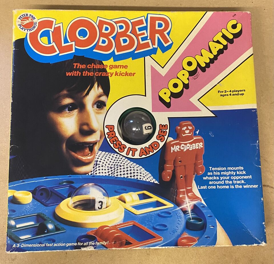 A vintage board game box for "CLOBBER POPOMATIC," featuring a smiling child, the game's colorful 3D playing surface with a clear dome containing a die, and a red figure named "MR. CLOBBER." Text on the box indicates it is a chase game for 2-4 players aged 4 and up, describing the gameplay and touting it as "A 3-Dimensional fast action game for all the family."