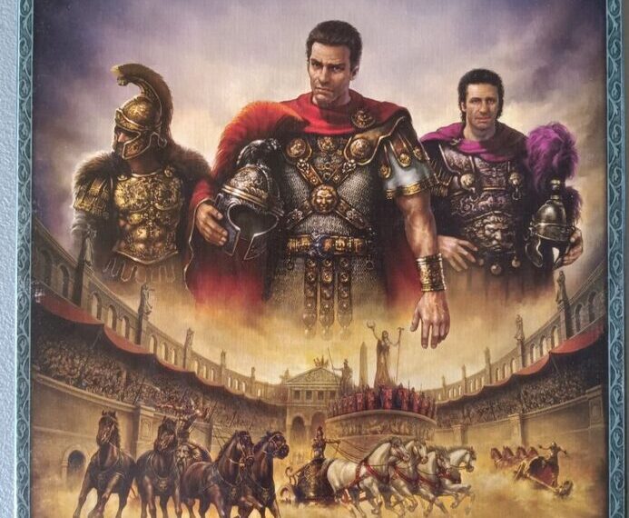Alt text: Box cover for the "AVE CAESAR" board game, featuring two armored Roman characters in the foreground and a chariot race in the Colosseum in the background. The game logo is at the top, and the Asmodee logo is at the bottom.