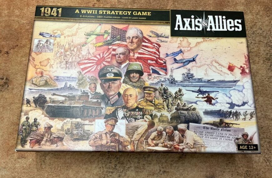 "Axis & Allies 1941 board game box cover featuring various World War II figures, scenes of battles on land, air, and sea, and a headline from 'The Daily News' about an invasion."