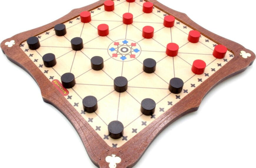 A Chinese Checkers board game with star-shaped layout, wooden edges, and game pieces in the middle of play, red and black pieces scattered across the board.