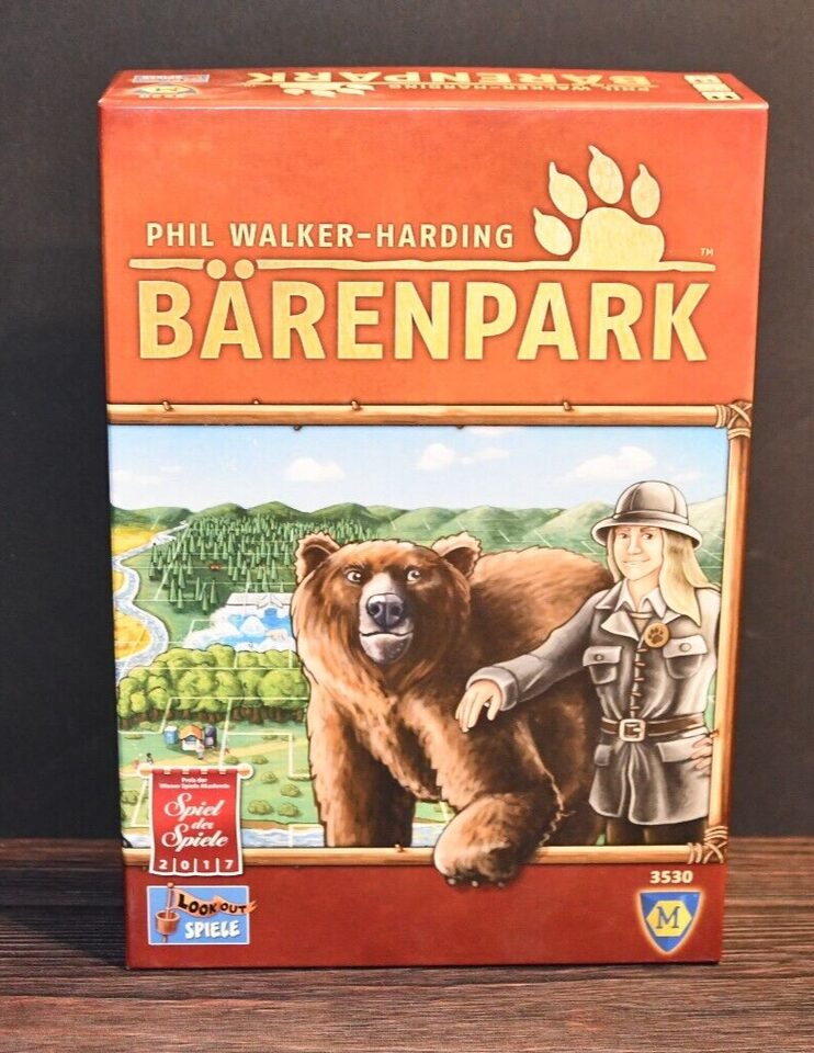 A board game called "Bärenpark" by Phil Walker-Harding, featuring an illustrated bear and a park ranger on the cover, displayed against a wooden background.