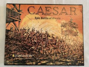 Board game box cover titled "CAESAR Epic Battle of Alesia" by The Avalon Hill Game Company, depicting a dramatic illustration of ancient warriors in combat with siege towers in the background.