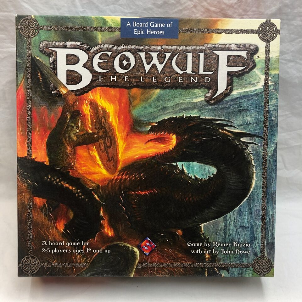 Alt text: A board game titled "Beowulf: The Legend" featuring artwork of a fierce dragon with Beowulf in combat, the text on the box says "A board game for 2-5 players ages 12 and up" and "Game by Reiner Knizia with art by John Howe".