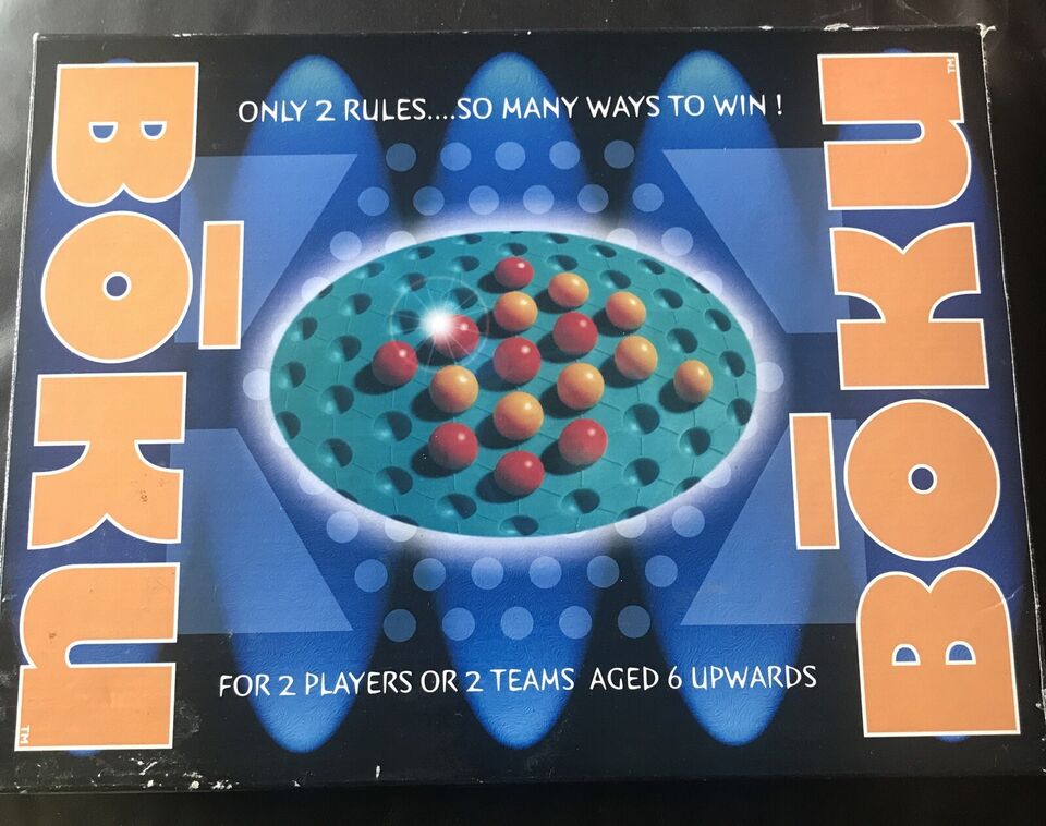 An image of the board game "BOKU" packaging with the text "ONLY 2 RULES...SO MANY WAYS TO WIN!" and "FOR 2 PLAYERS OR 2 TEAMS AGED 6 UPWARDS" displayed around a central image of a board with colorful pegs inserted into holes.
