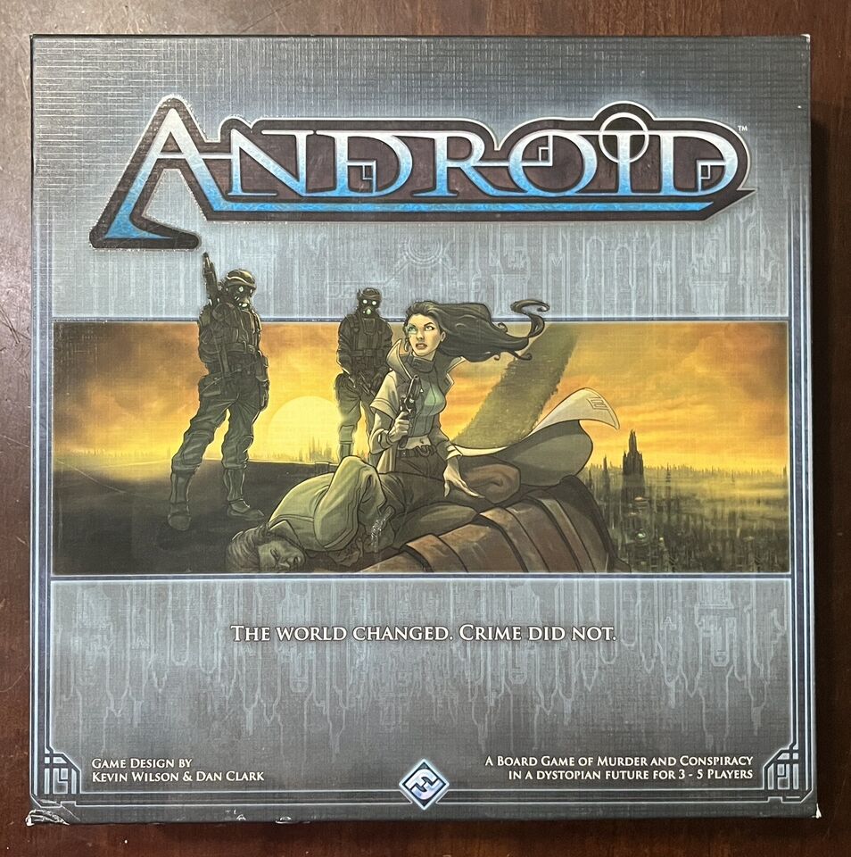 This image shows the box cover of the board game "Android," featuring a futuristic cityscape at sunset. In the foreground, there is a woman with a gun crouched on a rounded surface, with two armored soldiers behind her. The game's title "ANDROID" is prominently displayed at the top. Below the artwork, a tagline reads "The world changed. Crime did not." Further information includes "Game Design by Kevin Wilson & Dan Clark" and "A BOARD GAME OF MURDER AND CONSPIRACY IN A DYSTOPIAN FUTURE FOR 3 - 5 Players".