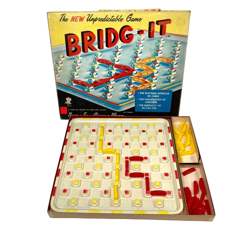 Board game "BRIDG-IT" with its box, featuring a grid playing field with red and yellow pieces, and additional pieces stored on the side.