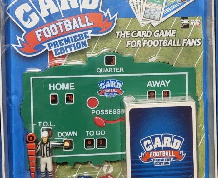Sealed "Card Football Premiere Edition" game package with a miniature football field scoreboard, referee figure, dice, and playing cards visible through the packaging.