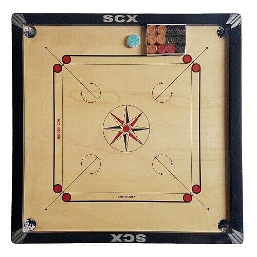 Carrom board with striker, coins set aside, and corner pockets visible.