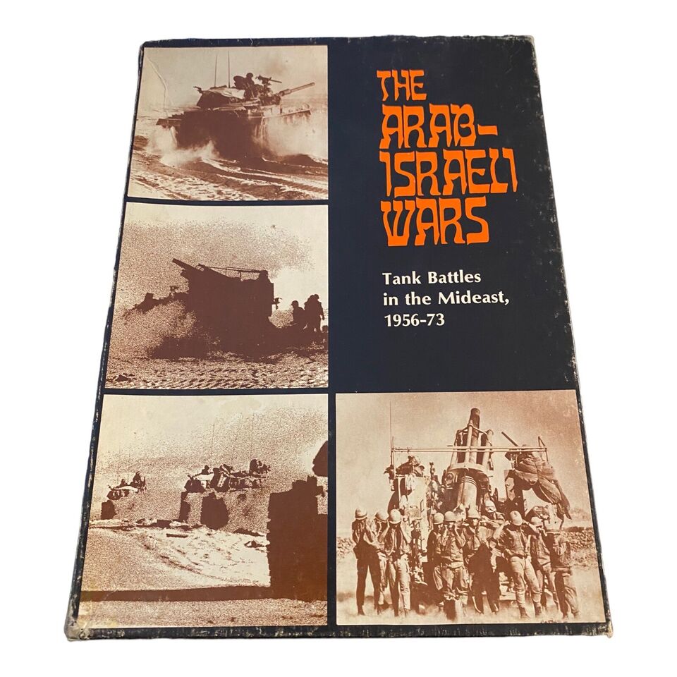 A worn book cover of "THE ARAB-ISRAELI WARS, Tank Battles in the Mideast, 1956-73" with sepia-toned images of tanks and soldiers.