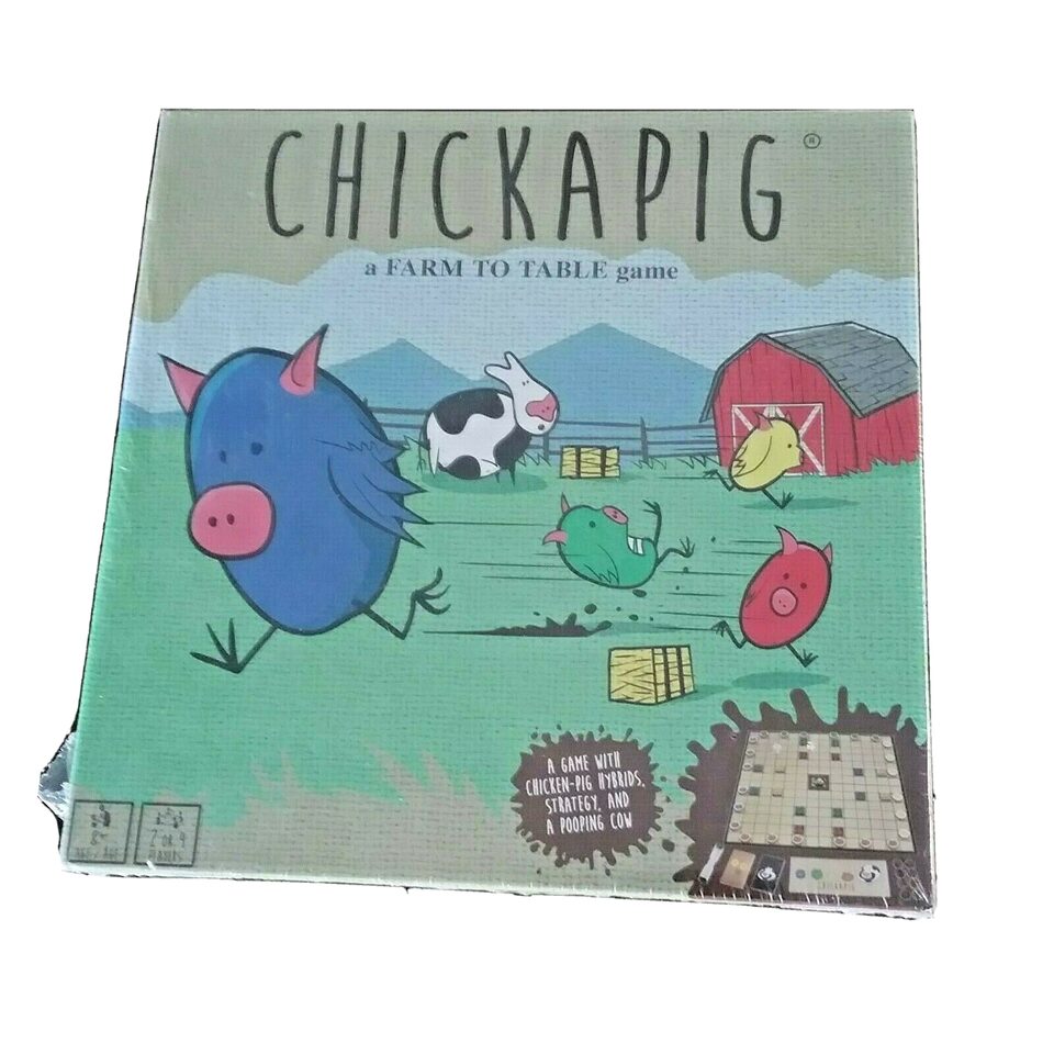 Alt text: The image shows a slightly worn board game box titled "CHICKAPIG, a FARM TO TABLE game" featuring cartoon illustrations of hybrid chicken-pig creatures, a cow, a red barn, and a pasture. Text on the box also reads "A GAME WITH CHICKEN-PIG HYBRIDS, STRATEGY, AND A POOPING COW." The corner of the box appears to be slightly damaged.