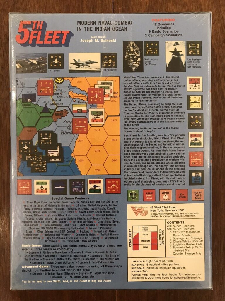 A photo of the board game "5th Fleet" box cover featuring a tagline "Modern Naval Combat in the Indian Ocean" and various images of military aircraft, ships, and a map. The cover also includes bullet points of the game's features, such as "Featuring 12 Scenarios" and "Special Game Features." The game is designed by Joseph M. Balkoski. The image shows the game is still in its original shrink wrap.