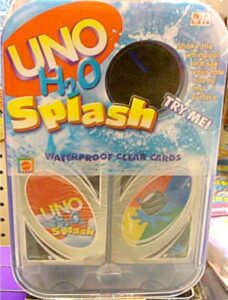 Packaging of UNO H2O Splash card game featuring waterproof clear cards, displayed in clear plastic with colorful card samples visible.