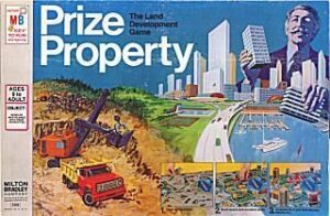 Vintage "Prize Property" board game box featuring a colorful illustration of land development scenes, including construction, cityscape, and a man holding architectural plans.