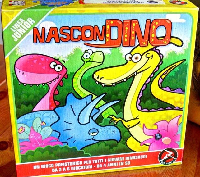 Colorful board game box named "NasconDino" featuring cartoon dinosaurs in a vibrant prehistoric landscape.