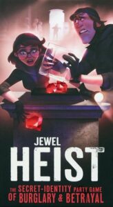 Promotional poster for "Jewel Heist," featuring two animated characters, one male and one female, in a dramatic scene where they are stealing gems. The background is dark with mist and a spotlight focused on the characters.