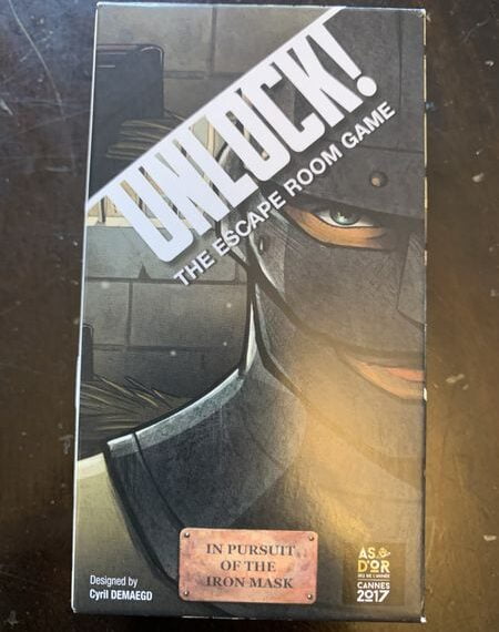Unlock!: The Escape Room Game – In Pursuit of the Iron Mask (2020) Board Game
